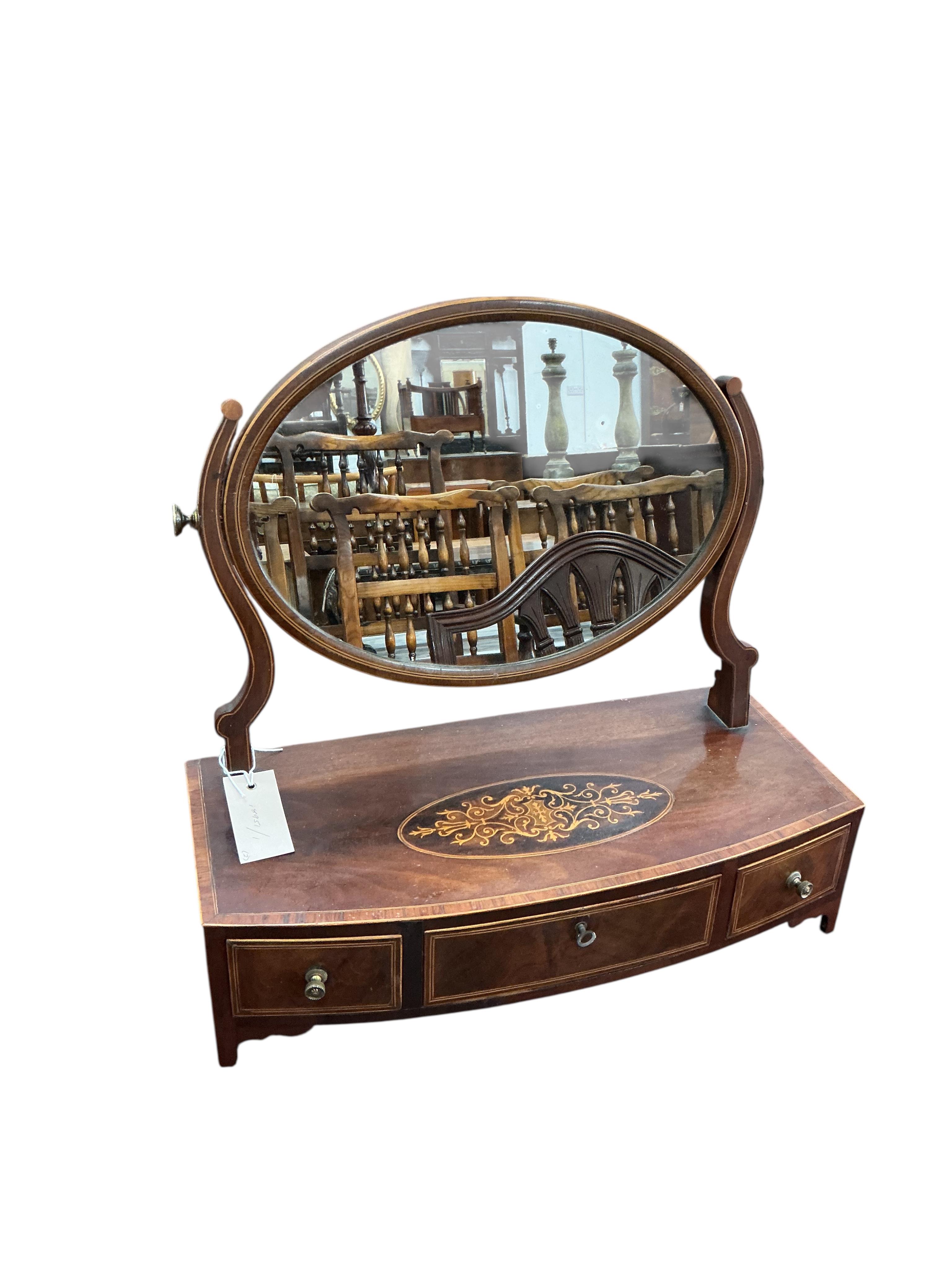 Two George III and later inlaid mahogany toilet mirrors, larger width 67cm, depth 24cm, height 79cm